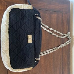 Black and white authentic Chanel bag.